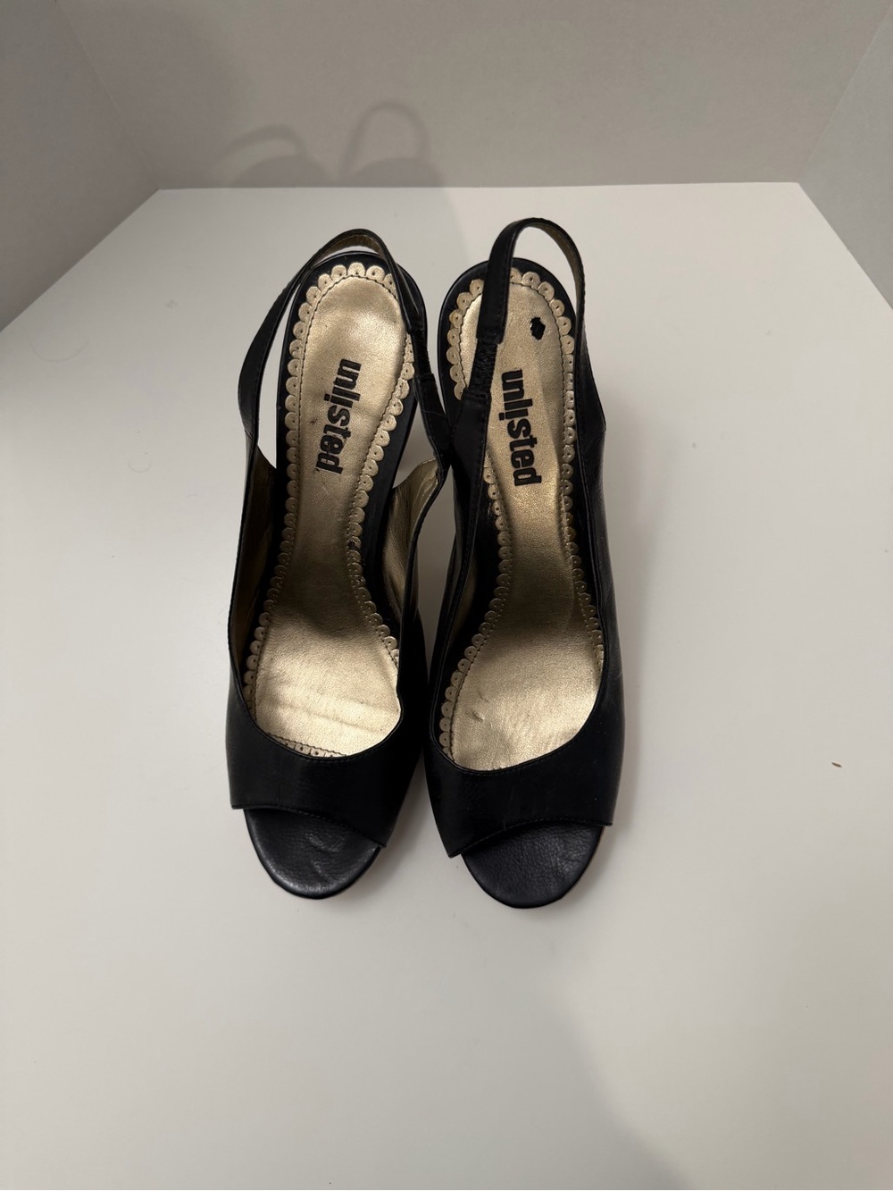 Unlisted Black Peep Toe Slingback Heels with Gold Insole